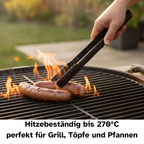 Grillzange aus Kunststoff 29,5 cm lang wendet ein Würstchen auf dem Grill.